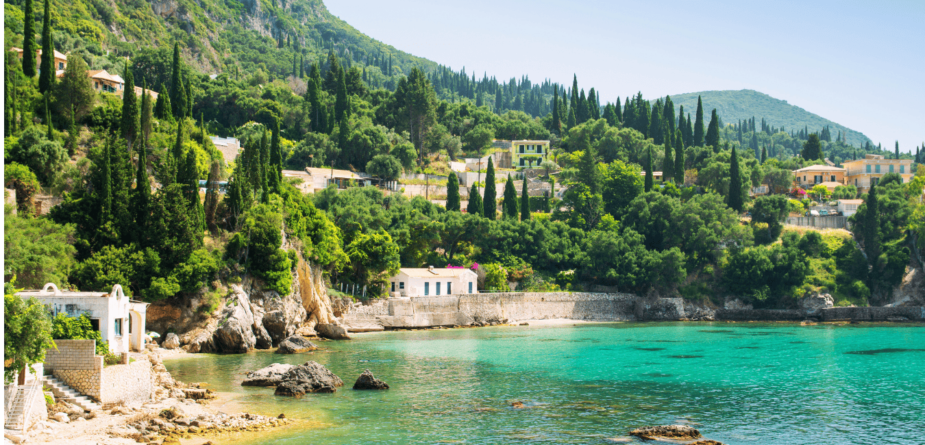 looking at a village on Corfu surrounded by trees
