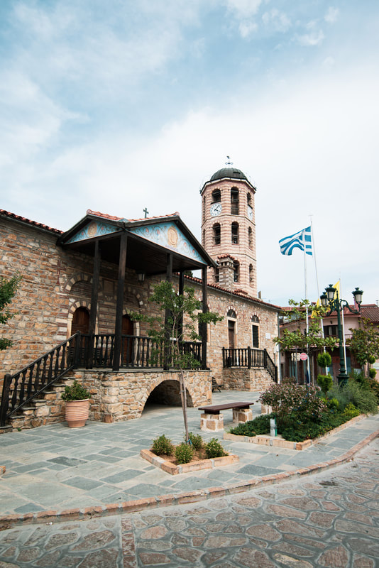 A clocktower and building in Arnaia, Halkidiki