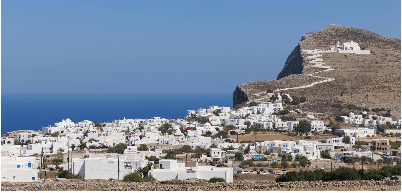 A hillside with whitewashed houses on 